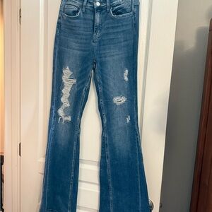 Women's Distressed Blue Jeans